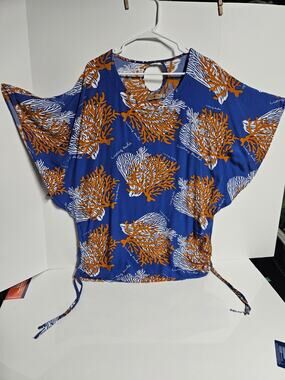 Living Hula top with a loose, flowy cut and side ties